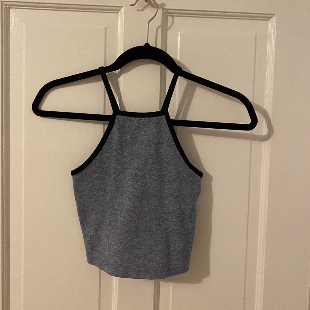 Cropped navy blue striped halter top.